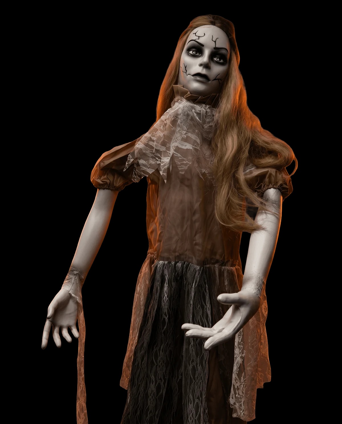 Animatronic prop: a ghost girl in a torn shift dress, arms outstretched.