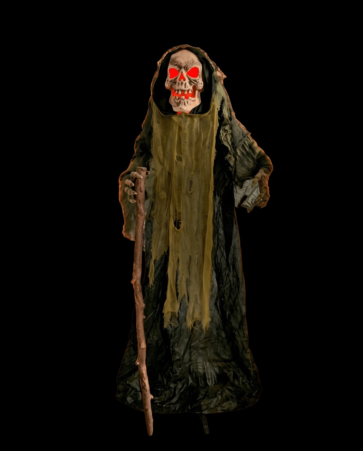 Animatronic prop: a grim reaper with a lit skull face and a wooden staff.