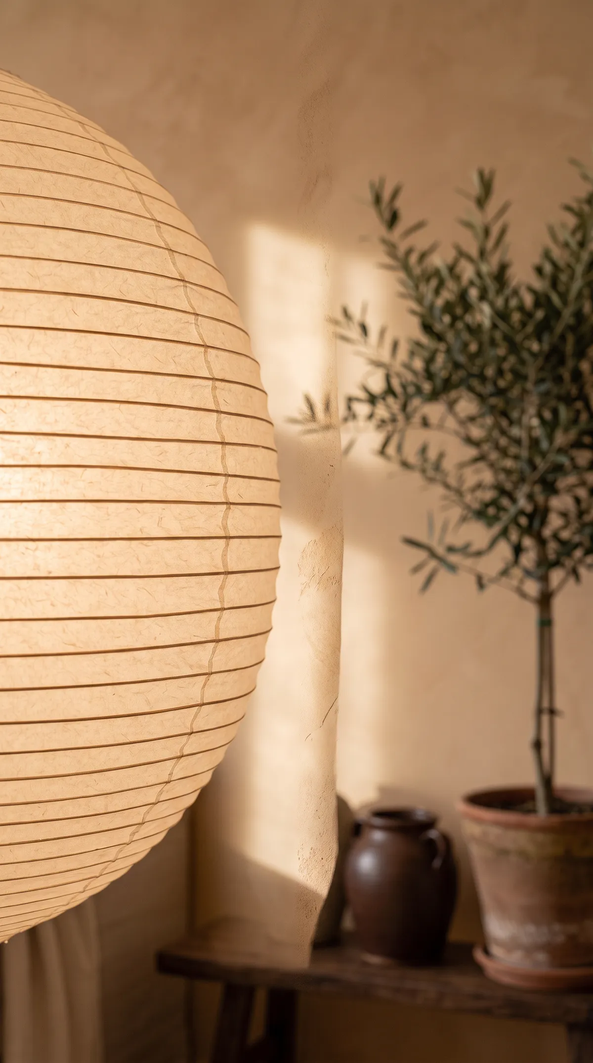 Japandi, paper lantern and clay wall