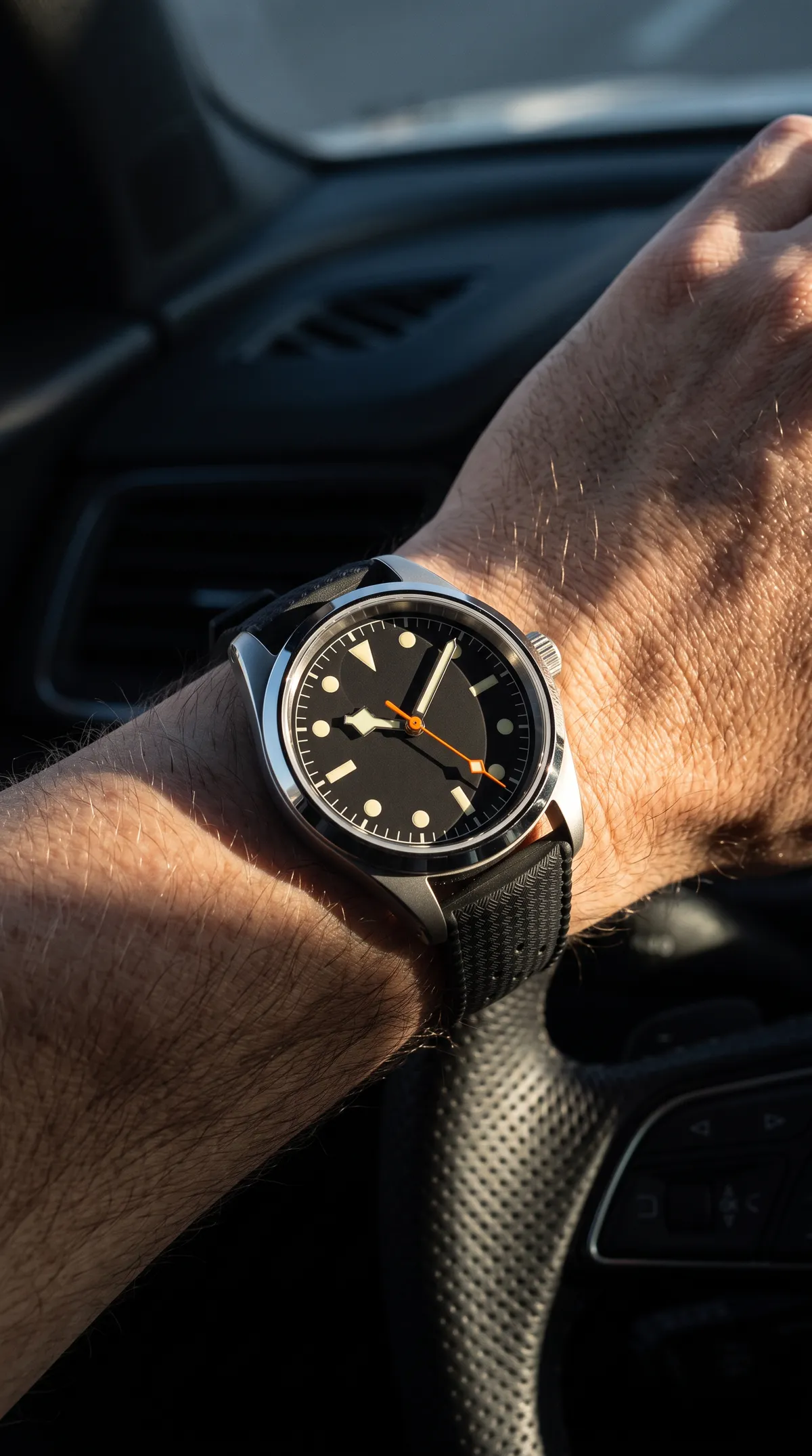 On the wrist, at the wheel